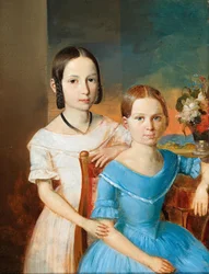 Sorelle contro uno sfondo paesaggistico